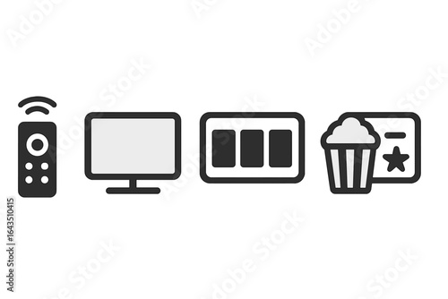 Watching a movie at home with a remote control and snacks in the cozy living room during an evening