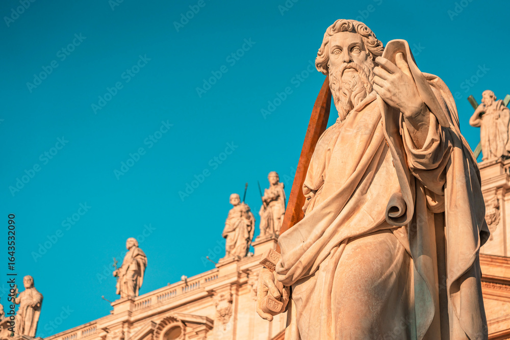 Fototapeta premium Statue of Saint Paul Apostle with Saint Peter Basilica in Vatican City