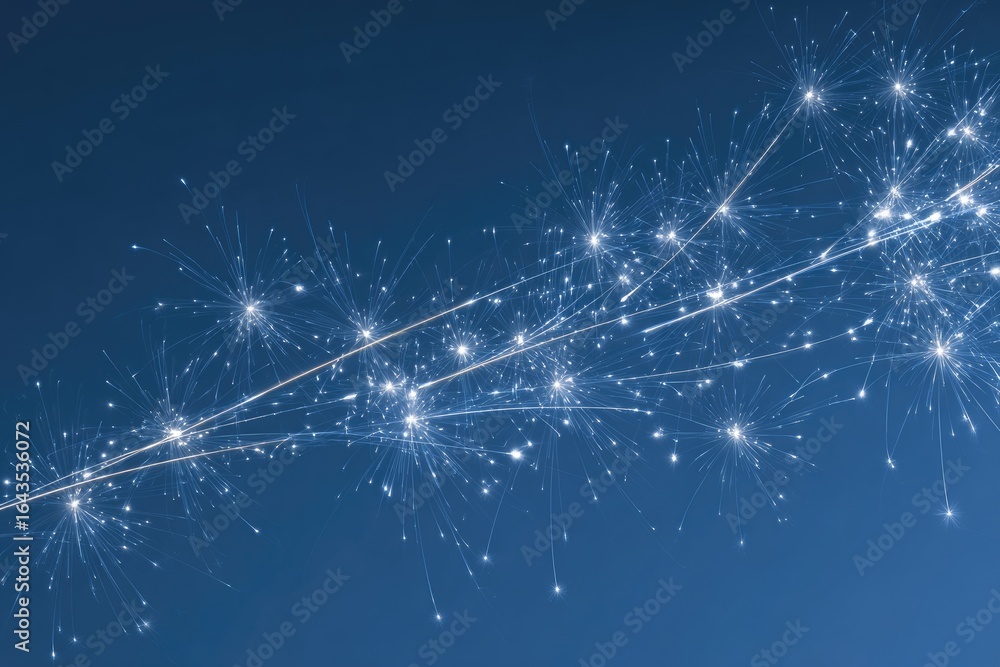 Fototapeta premium Abstract firework display, sparkling trails against a deep blue background