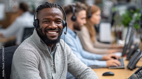 Wallpaper Mural Smiling Man Wears Headset, Working in Call Center Office, Focused Customer Service Torontodigital.ca