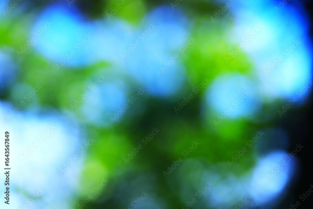 Obraz premium 青と緑の光をぼかした背景素材 