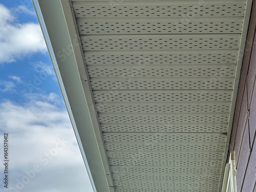 Roofing soffit detail showing ventilation and trim work