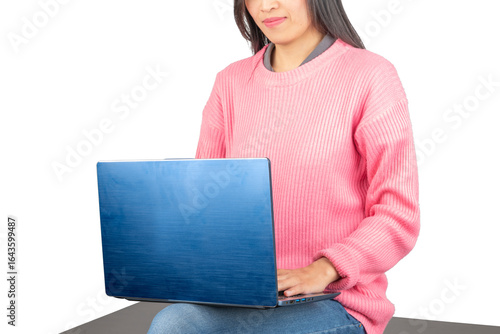 Woman Sitting and Typing on Laptop Indoors (Isolated)