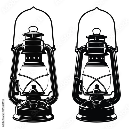 Two antique kerosene lanterns with glass globes and metal frames