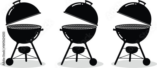 Black kettle grills open lids outdoor cooking