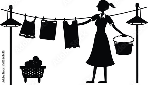 a woman hangs clothes on the line with a sudsy basket in hand