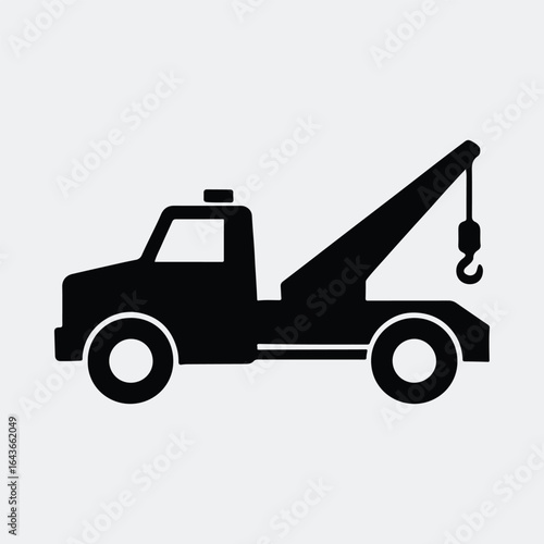 Silhouette tow truck isolated roadside assistance vehicle vector illustration