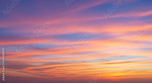 Fototapeta Naklejka Na Ścianę i Meble -  Beautiful sunset sky with colorful clouds creating a serene and peaceful scene