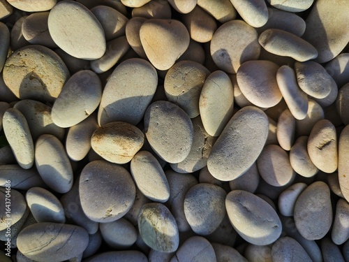 Photography Top-Down View of White and Grey River Pebbles