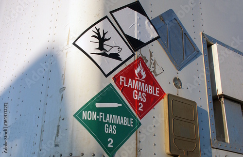 Flammable and non flammable hazmat stickers on front
corner of trailer.  Resubmission with intellectual property removed.