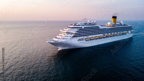 Cruise ships sail the sea, taking passengers or tourists on sea trips to various destinations around the world.