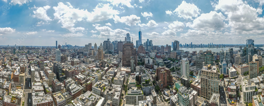 Obraz premium Aerial city scape of skyscraper buildings SoHo Manhattan on a sunny summer day in New York City