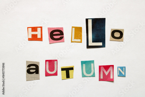Hello autumn letters cut from colorful magazines saying hello autumn