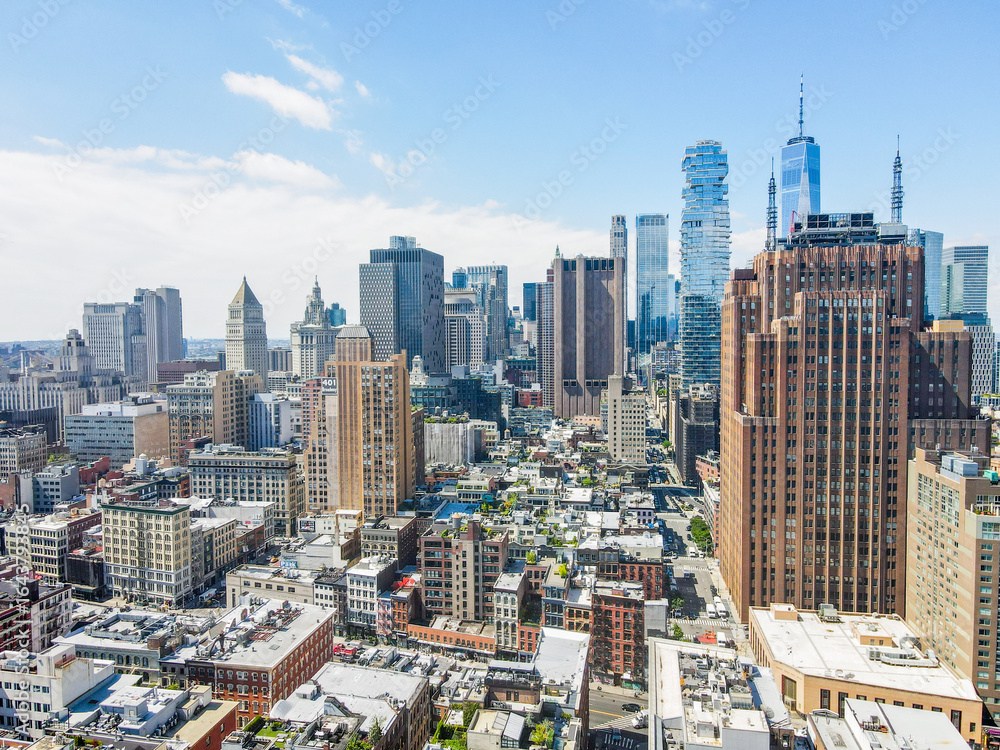 Obraz premium Aerial city scape of skyscraper buildings SoHo Manhattan on a sunny summer day in New York City