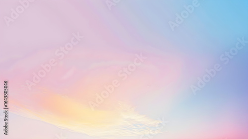 A tranquil gradient sky blending soft pastel hues—light pink and lavender on the left, fading into pale blue on the right. Wispy clouds hover near  bottom center, adding gentle texture to atmosphere.