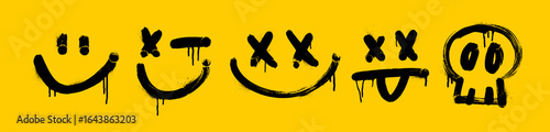 Graffiti spray paint faces with smile, grunge skull. Collection of face and emotion symbols on yellow background.