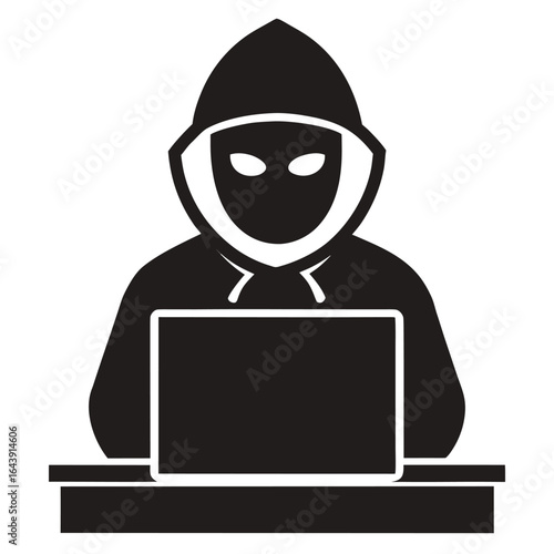 Hacker wearing mask using laptop to steal data online