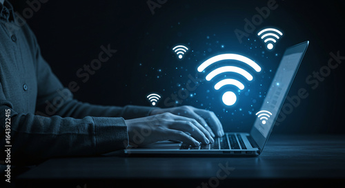 Wireless internet connection and networking technology. Person using laptop to access WiFi and online communication.