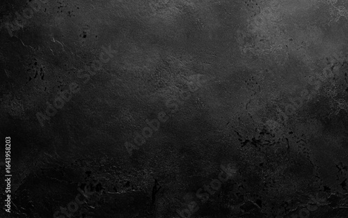Dark concrete floor texture, great for grunge backgrounds. May be used for design as background.