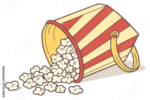 Spilled bucket of popcorn with red and yellow stripes isolated on white background