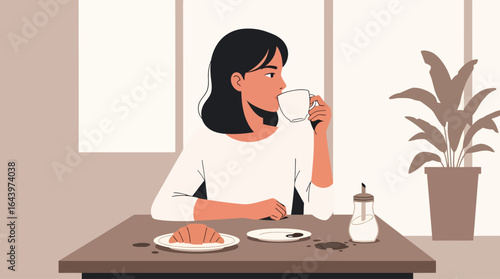 Woman Enjoying Coffee and Croissant at a Table Near a Window.