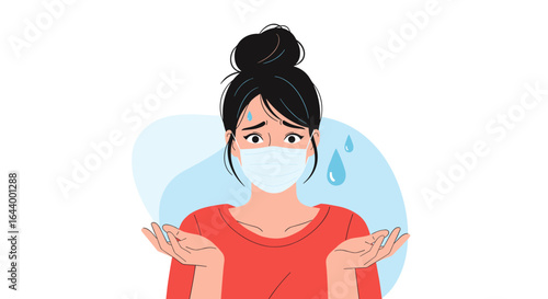 Young woman feeling overheated while wearing a protective face mask outdoors