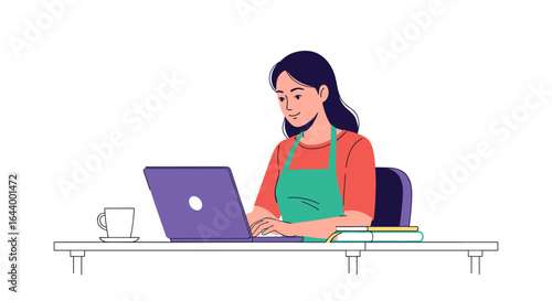 Focused young woman works productively on laptop at desk