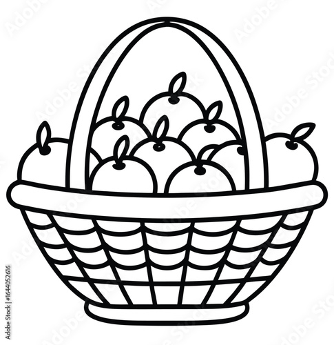 A traditional wicker basket filled with colorful Easter eggs and other food is a seasonal decoration for the spring holiday celebration