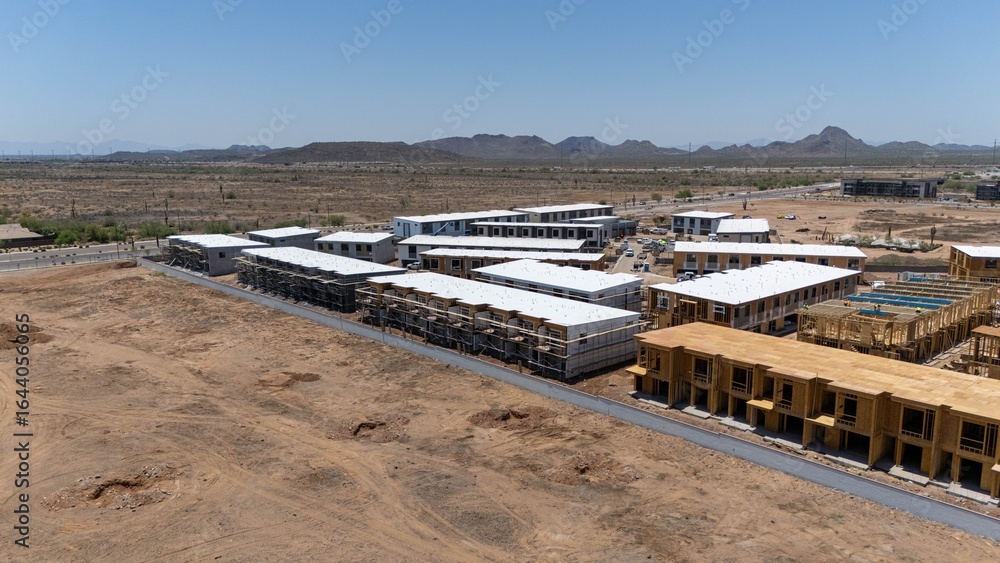 Fototapeta premium Aerial view of a construction site in a desert landscape.