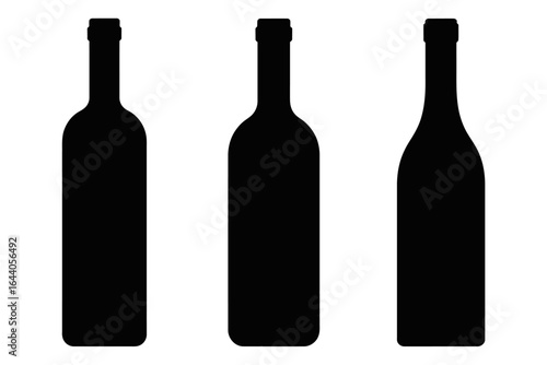 Silhouette of three wine bottles in black with various shapes isolated on a white background