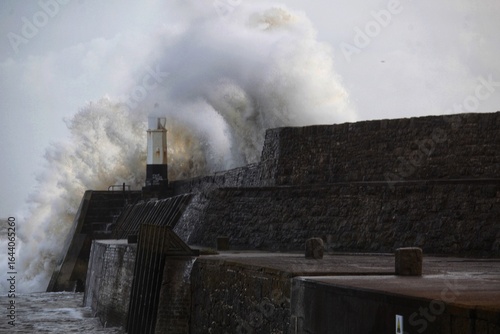 A huge wave engulfing Porthcawl lighthouse.
