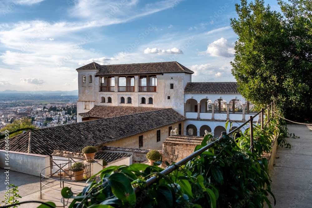 Fototapeta premium Palacio de Generalife in Granada, Spain. View of the Palacio de Generalife from the Alhambra in Granada, Spain. Summer palace of Nasrid Emirs during the Moorish reign in Granada