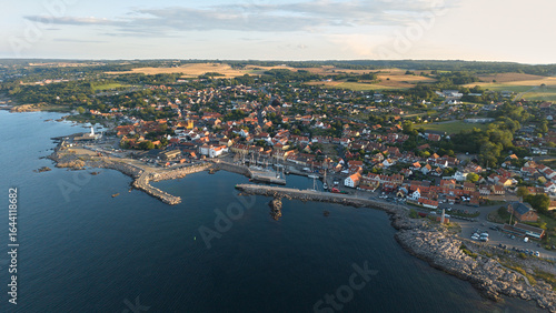 Panoramic Aerial View of Allinge Coastal Town on Bornholm Island with Rocky Shoreline and Colorful Seaside Buildings