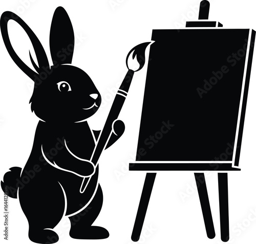 Cute bunny artist painting on an easel silhouette