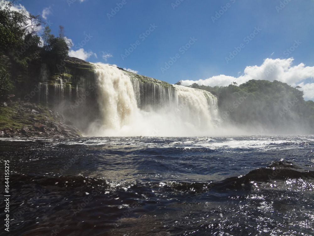 Fototapeta premium Spectacular view of a waterfall inside Canaima National Park in Venezuela