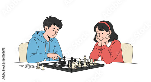 Young boy and girl playing chess together with focused concentration and enjoyment