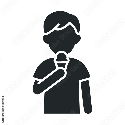Silhouette of child eating ice cream icon in black and white