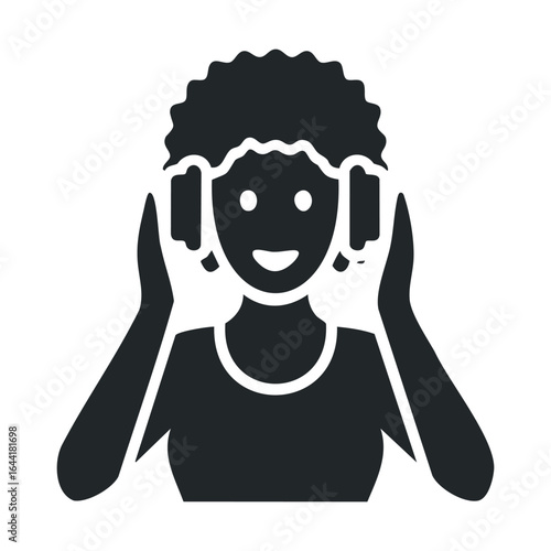 Silhouette of african adult female wearing headphones and smiling