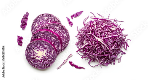 Fresh red cabbage sliced and shredded for a healthy meal preparation on a white background.