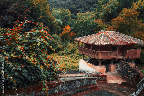 Cuadro en lienzo Traditional Asturian horreo granary on stone stilts with a tiled roof and wooden