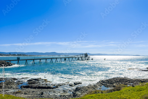 Wallpaper Mural Drone aerial photograph of an old and weathered industrial loading jetty in the South Pacific Ocean near Shellharbour in the Illawarra region on the south coast of New South Wales, Australia.  Torontodigital.ca