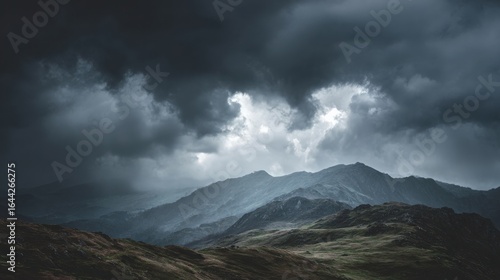 Moody overcast sky with rich grey tonal variations for dramatic backdrop.
