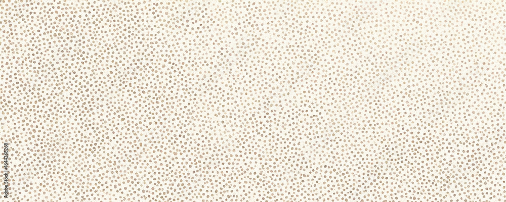 Fototapeta premium Beige dotted txture creates subtle pattern, ideal for backdrop design, branding, or website wallpaper.