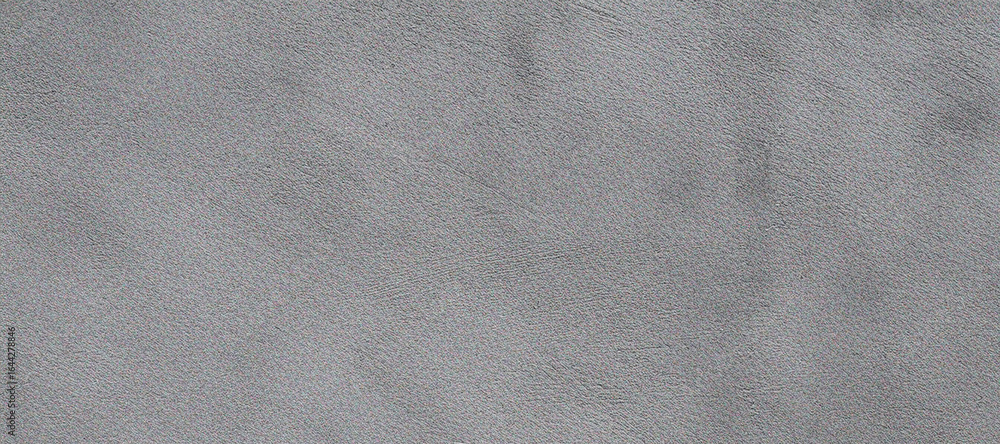 Naklejka premium Soft gray paper texture presents a clean, minimal surface with subtle shadows, ideal for product display, branding, or video backdrop.