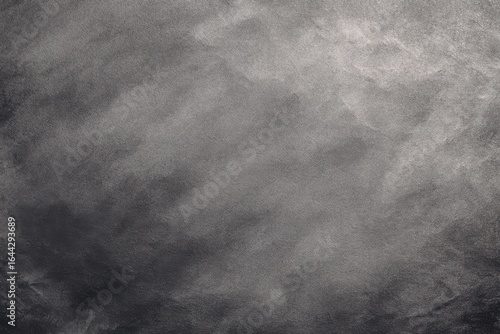 Solid charcoal grey background with even neutral tone.