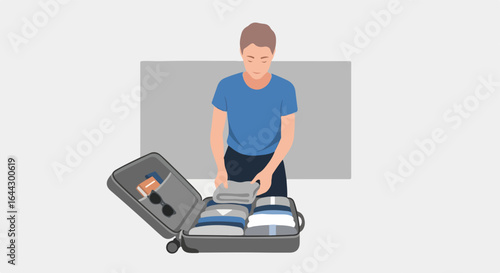 Packing suitcase for trip. Person neatly folds clothes and places them in suitcase. Preparing for summer vacation involves packing essentials into rolling suitcase.