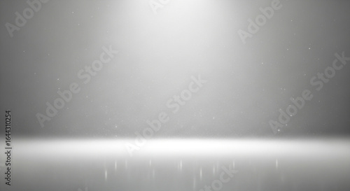 Sparkling spotlight illuminates a pristine stage with shimmering particles for dramatic effect