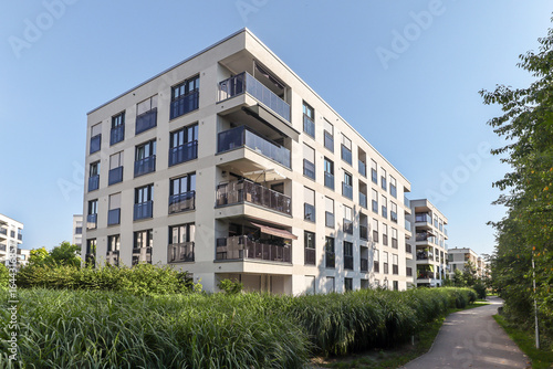 Cityscape of a residential area with modern apartment buildings, new green urban landscape in the city