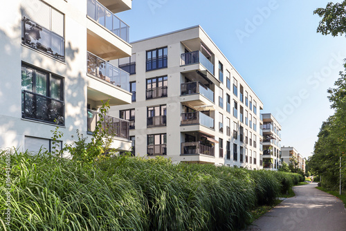 Cityscape of a residential area with modern apartment buildings, new green urban landscape in the city
