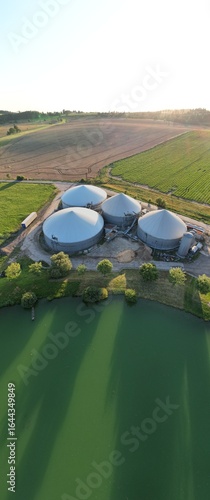 biogas production, biogas plants, bioenergy,aerial panorama landscape view of bio gas production facility and powerplant,European union energy crisis,green renewable energy production,Europe